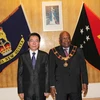 Đại sứ Nguyễn Xuân Thủy và Toàn quyền Papua New Guinea. (Ảnh: Việt Tú/Vietnam+)