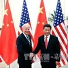Chủ tịch nước Trung Quốc Tập Cận Bình (phải) và Phó Tổng thống Mỹ Joe Biden. (Nguồn: AFP/TTXVN