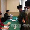 Cử tri Turkmenistan bỏ phiếu tại một địa điểm bầu cử ở Kipchak ngoại ô Ashgabat. (Nguồn: AFP/TTXVN)