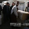 Chuyển thi thể người thiệt mạng trong một vụ đánh bom tại tỉnh Ghanzi, Afghanistan. (Nguồn: THX/TTXVN)