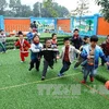Học sinh trường Mầm non B Thanh Liệt, huyện Thanh Trì, Hà Nội, vui chơi ngoài trời. (Ảnh: Quý Trung/TTXVN)