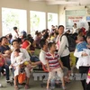 Trẻ em đến khám và điều trị tại Bệnh viện Nhi đồng 1 Thành phố Hồ Chí Minh. (Ảnh: Phương Vy/TTXVN)