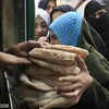 Người dân Ai Cập xếp hàng mua bánh mì. (Nguồn: Getty)