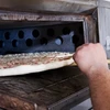 Người Italy lo ngại bánh pizza ngày càng mất chất truyền thống