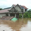 Thị trấn Lao Bảo, Quảng Trị chìm trong nước lũ. Ảnh minh họa. (Nguồn: TTXVN)