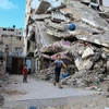 Cảnh đổ nát sau cuộc xung đột ở Gaza ngày 22/6. (Nguồn: THX/TTXVN)