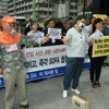 Người dân Hàn Quốc tuần hành phản đối Mỹ chuyển nhầm mẫu phẩm bệnh than tại Seoul. (Nguồn: Yonhap/TTXVN)