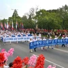 Người dân Triều Tiên míttinh mừng 70 năm đất nước được giải phóng tại thủ đô Bình Nhưỡng ngày 15/8. (Nguồn: AFP/TTXVN)