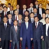 Thủ tướng Nguyễn Tấn Dũng với các Trưởng đoàn. (Ảnh: Đức Tám/TTXVN)
