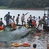 Hiện trường một vụ lật thuyền ở Malaysia. (Nguồn: AP)