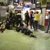 Người di cư tại nhà ga ở Munich ngày 12/9. (Nguồn: AFP/TTXVN)