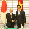  Tổng Bí thư Nguyễn Phú Trọng và Thủ tướng Nhật Bản Shinzo Abe tại Tokyo. (Ảnh: Trí Dũng/TTXVN)