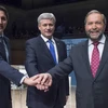 Lãnh đạo LIB Justin Trudeau (trái), lãnh đạo CPC - Thủ tướng Canada Stephen Harper (giữa) và lãnh đạo NDP Thomas Mulcair. (Nguồn: Reuters/TTXVN)