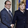 Tổng thống Pháp Francois Hollande (trái) và Thủ tướng Đức Angela Merkel tại cuộc gặp. (Nguồn: AFP/TTXVN)