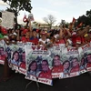 Những người ủng hộ Tổng thống Nicolas Maduro trong chiến dịch vận động tranh cử của ông tại sân vận động ở Caracas ngày 1/12. (Nguồn: AFP/TTXVN)