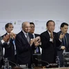 Thỏa thuận chống biến đổi khí hậu toàn cầu đã được Hội nghị COP21 thông qua. (Nguồn: AFP/TTXVN)