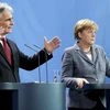 Thủ tướng Áo Werner Faymann và Thủ tướng Đức Angela Merkel. (Nguồn: Reuters)