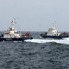 Tình huống diễn tập của tàu cảnh sát biển Việt Nam trên biển. (Ảnh: Trọng Đức/TTXVN)