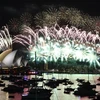 Pháo hoa rực rỡ trên Cầu cảng Sydney. (Nguồn: AFP/TTXVN)