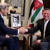 Quốc vương Jordan Abdullah II (phải) và Ngoại trưởng Mỹ John Kerry. (Nguồn: AFP/TTXVN)