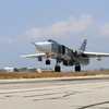 Máy bay Sukhoi SU-24 của Nga tại căn cứ không quân Hmeimim ở tỉnh Latakia, Syria ngày 3/10. (Nguồn: AFP/TTXVN)