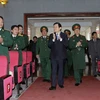 Chủ tịch nước Trương Tấn Sang đến thăm, chúc Tết cán bộ, giảng viên và học viên Học viện Hậu cần. (Ảnh: Nguyễn Khang/TTXVN)
