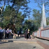 Lễ tưởng niệm vụ thảm sát Bình An. (Ảnh: Ly Kha/TTXVN)