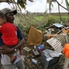 Cảnh đổ nát sau cơn bão Winston tại Madhuvani, Fiji ngày 26/2. (Nguồn: AFP/TTXVN)