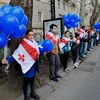 Biểu tình tại Gruzia phản đối chính phủ mua khí đốt của Tập đoàn Nga Gazprom . (Nguồn: AP)