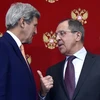 Ngoại trưởng Nga Sergei Lavrov và người đồng cấp Mỹ John Kerry. (Nguồn: AFP/TTXVN)