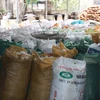Mỡ bẩn chứa trong các bao tải phát hiện tại một cơ sở chế biến tại Hà Nội. (Nguồn: TTXVN)