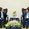 Thủ tướng Nguyễn Xuân Phúc tiếp ông Jonathan Choi, Chủ tịch Tập đoàn Sunwah, Hong Kong. (Ảnh: Thống Nhất/TTXVN)