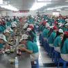 Một doanh nghiệp tại khu chế xuất Tân Thuận xây dựng bếp ăn tập thể ngay tại công ty. (Ảnh: Phương Vy/TTXVN)