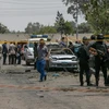 Lực lượng an ninh Ai Cập điều tra tại hiện trường vụ đánh bom ám sát Tổng Công tố Barakat ở Cairo. (Nguồn: THX/TTXVN)