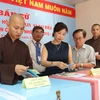 Cử tri bỏ phiếu tại khu vực bầu cử số 60, phường 9, quận 3, Thành phố Hồ Chí Minh . (Ảnh: Hứa Chung/TTXVN)