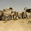 Binh sỹ Afghanistan làm nhiệm vụ trong chiến dịch tấn công phiến quân Taliban tại khu vực Nahr-e-Saraj, tỉnh Helmand ngày 11/5. (Nguồn: THX/TTXVN)