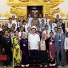 Phó Thủ tướng Vương Đình Huệ với các đại biểu. (Ảnh: Phương Hoa/TTXVN)