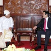 Đại sứ đặc mệnh toàn quyền Liên bang Myanmar Win Hlaing hội kiến Chủ tịch nước Trương Tấn Sang năm 2014. (Ảnh: Nguyễn Khang/TTXVN)