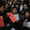 Người biểu tình tập trung bên ngoài văn phòng tờ báo tiếng Trung Quốc hồi năm 2014. (Nguồn: AFP)