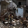 Những ngôi nhà bị phá hủy trong một cuộc không kích ở Sanaa ngày 3/8. (Nguồn: EPA/TTXVN)