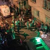 Xe cứu thương tới hiện trường sau vụ tấn công khủng bố. (AFP/TTXVN)
