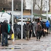 Người di cư tại trại tị nạn tạm Jungle ở Calais, miền bắc Pháp ngày 25/2. (Nguồn: AFP/TTXVN)