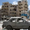 Cảnh đổ nát sau các cuộc giao tranh giữa quân đội Chính phủ và lực lượng nổi dậy tại thành phố Aleppo ngày 28/4. (Nguồn: AFP/TTXVN)