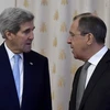 Ngoại trưởng Mỹ John Kerry (trái) và Ngoại trưởng Nga Sergei Lavrov trong cuộc họp báo công bố đạt được thỏa thuận ngừng bắn ở Syria, tại Geneva, Thụy Sĩ ngày 9/9. (Nguồn: AFP/TTXVN)