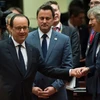 Tổng thống Pháp Francois Hollande (trái) và Thủ tướng Anh Theresa May (phải) tại Hội nghị. (Nguồn: AFP/TTXVN)
