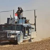  Lực lượng Chính phủ Iraq trong chiến dịch truy quét IS tại Qayyarah, Mosul ngày 20/10. (Nguồn: AFP/TTXVN)