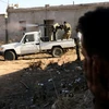 Các tay súng thuộc lực lượng đối lập Quân đội Tự do Syria (FSA) trong chiến dịch chống IS tại khu vực Dabiq, Syria ngày 15/10. (Nguồn: AFP/TTXVN)