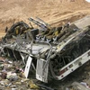 Hiện trường một vụ tai nạn xe khách tại Afghanistan. (Nguồn: THX/TTXVN)