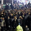  Cảnh sát Đức dàn hàng để kiểm soát những người nhập cư ở Cologne, Đức ngày 31/12. (Nguồn: EPA/TTXVN)