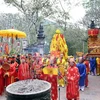 Lễ rước truyền thống tại hội đền Sóc. (Ảnh: Quang Quyết/TTXVN) 